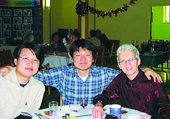 Korean Mission Society members Fr. Hyo Jun and Fr. Ji Hoon, with Scarboro lay missioner Louise Malnachuk, a member of Scarboro's China mission team and now home on leave.