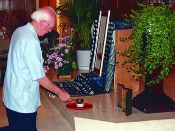 After serving many years among the Japanese people, Fr. Gerald Curry strikes a gong during the Prayers of the Faithful at a Scarboro community Mass in Toronto celebrating the people of Japan. It is the Japanese tradition to ring a gong or bell, letting the sound resonate as our prayers rise up to God.