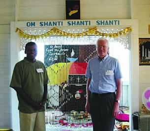In Guyana, a nation of primarily Hindus, Muslims and Christians, Fr. David Warren visits with Fr. Paramaivam Stanislaus Arul, a Jesuit priest from India and the founder of an interfaith house of prayer in Port Mourant.