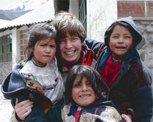 Carolyn with children in Peru