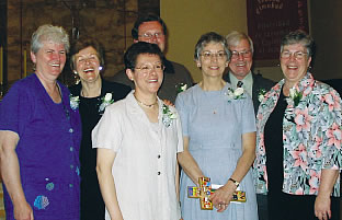 L-R: Sharon Willan of the Lay Mission Office; new missioners Kate O'Donnell, Estrela DeSousa, Mike Hiebert and Barbara Michie and John & Jean MacInnis, coordinators of the Lay Mission Office.  Missioning ceremony, May 2004