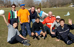Celebrating a great soccer match played by the Scarboro community: priests, laity, and the Latin American and Korean missioners living at Scarboro while in Canada to learn English. Background L-R: Estrela DeSousa, seminarian Wilian Gerardo Rojano Moya, Mike Hiebert, Kate O'Donnell; Foreground L-R: Fr. Hyo Jun Kwon, seminarian Jose Ivan Campana Suarez, Fr. Mike Traher, Fr. Yu Sung Lee, Fr. Kwang Kee Park.