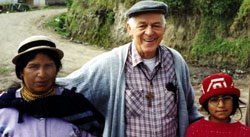This young girl, here with her mother and Fr. Charles Gervais, has just received much-needed glasses for the first time. Riobamba, Ecuador.