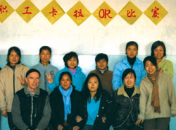 TEACHING: Fr. Brian Swords with some of his students at a university in China. Other Scarboro missioners also teaching at institutions and walking with the people of China are Cynthia Chu, Sr. Jean Perry CSJ, and Fr. Roger Brennan. Scarboro missioner Fr. Ray O'Toole in Hong Kong has been named Assistant Secretary-General of the Federation of Asian Bishops Conferences.