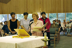 Lorraine Reaume makes her commitment and profession of final vows in the presence of family, friends and members of her community. August 6, 2005. Adrian, Michigan.