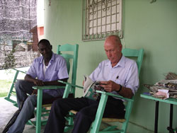 Meillo drops in for a chat with Scarboro missioner Fr. Joseph McGuckin, pastor of the parish of Matanzas, Dominican Republic. Many people come to Fr. Joe's door each day for a bit of food or some assistance, or maybe just to talk with 'el Padre'. (Credit Fr. Jack Lynch, S.F.M.)