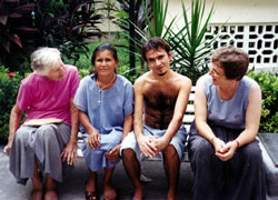 In the little garden near the infirmary of Sao Jos. Hospital, Francisco and his mother spend time together and enjoy a visit from Sr. Mary Hughes (left) and Scarboro missioner Beverly Trach. Francisco was very sick when he was admitted and is recuperating well. Since his family live quite a distance from the city, visits with his mother are rare and precious, and very important to his well-being.