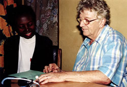 Erdoo and Sr. Mary Deighan at the monthly support group for persons living with HIV/AIDS. There are six groups that meet once a month and receive treatment at the village health centre every Wednesday. Some are living positively and doing well. Some newly diagnosed are afraid, angry and sad. All worry about what will happen to their children and families in the future. Their courage is a gift to Sr. Mary. Benue State, Nigeria.