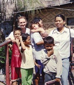 Sr. Christine Gebel, Curding and Anie Montejo with neighbourhood children. Anie is currently discerning her vocation as a novice with Our Lady's Missionaries. Bitan-ag Village, Cagayan de Oro, Philippines.