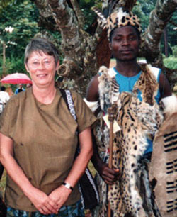 Scarboro missioner Mary Olenick with a Ngoni tribal warrior. Malawi.