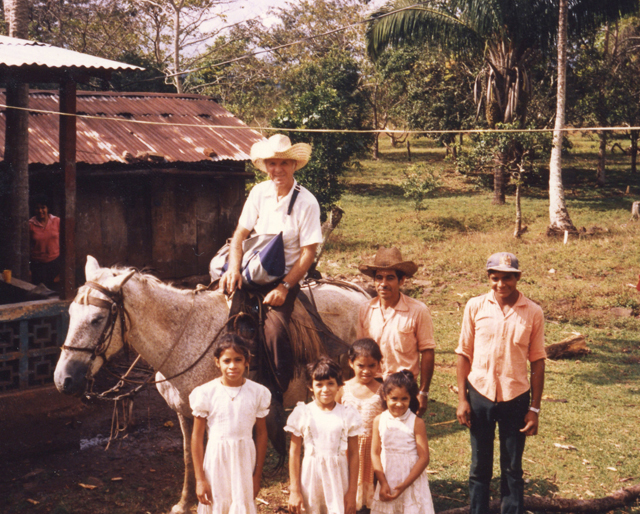 Fr. Joe Curcio visits with peasant farmers in Nicaragua. Fr. Curcio also served in the Dominican Republic and among Native peoples in Canada.