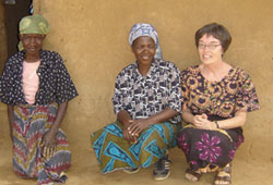 Beverley Vantomme visits Phil and an elder at their villalge. Phil was Beverley's first student in Malawi studying to b a mental  health worker and now works at the Rehabilitation Centre of St. John of god Community Services. Mzuzu.