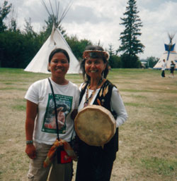 Anie Montejo with Wendy, a First Nations woman from Vancouver at a pilgrimage in Lac Ste. Anne, Alberta.  Every year 30,000 Aboriginal people from Canada and the United States gather in Lac Ste. Anne to honour St. Anne, the grandmother of Jesus, as the patron saint of the ancestors.