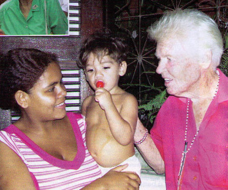Sr. Mona Kelly with Regelane and her baby Julios C.sar. Sr. Mona continues her activities at GDFAM, an organization offering support to families. They conduct courses to help mothers and young people become wage earners, and provide activities for youth to keep them off the streets. After her baby was born Regelane took a sewing course at the centre and is now able to support herself and her child. Regelane has said that in appreciation for the assistance that was given to her and her family these many years, she will offer her help to a friend who has two children and is physicially handicapped. Recently the directorship of the Little Libraries, a literacy initiative that Sr. Mona was instrumental in founding in the community, has been assumed by local women. As well, twice a week Sr. Mona joins other pastoral workers, including Scarboro lay missioner Beverly Trach, to meet with women, homeless children and youth in public parks and bus terminals, their favourite hangouts. These informal meetings build friendships and open doors to stories of a lifetime of pain, abuse, hunger and rejection, as well as stories of hope and genuine concern for each other.