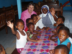 Sr. Cecile Turner with Charity sister Noella and the little ones in her care at the Missionaries of charity Orphanage. New Amsterdam, Guyana