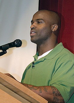 Ricky Williams addresses the students at Cardinal Newman High School, December 16, 2006.