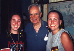 Fr. Lou Quinn with Kendra Smith and Jennifer Wattie, students from St. Joseph Catholic Secondary School, Hamilton. 2003.