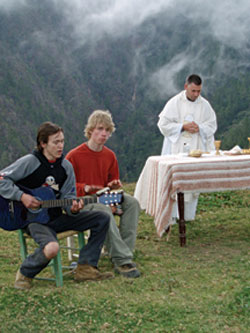 While volunteering in the mountains of Ocoa, D.R.E.A.M.S. participatns Steven Tebay and Jordan Bowman of St. Mary Catholic Secondary School provide musical accompaniment for Mass celebrated by Fr. Kevin Cull.  The D.R.E.A.M.S. project began with students from St. Mary's, but graduates of the school have gone on to start D.R.E.A.M.S. projects at various universities and colleges across Canada.