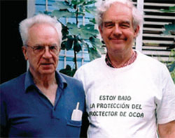 John Graham with his friend of 47 years, Lou Quinn, at the parish house in Ocoa. John is wearing a T-shirt commemorating the 2002 declaration by the Dominican Senate naming Lou 'Father Protector' of the newly created state of San José de Ocoa and Godfather to the community run development organization, ADESJO.