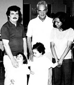 Marielle Murphy, her younger sister Danielle, and her parents Dan and Mara visiting with Fr. Lou Quinn (centre) in San José de Ocoa, Dominican Republic. (1985). Dan Murphy, a former Scarboro missioner, served with Lou in the Dominican Republic in the 1960s and 70s.