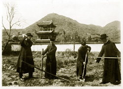 Monsignor John Mary Fraser (R) at the start of a building project, a church in Lungchuan, China, (1928) with (L-R) his brother, Fr. William Fraser, Fr. Paul Kam, and Fr. Ramon Serra. Msgr. Fraser founded Scarboro Missions (then known as China Missions) in 1918 to train and send priests to China.