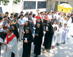 A 2006 Benediction procession at the Catholic Church in Lishui. Missionaries from the China Mission College (precursor to Scarboro Missions) first arrived in Lishui in 1926.