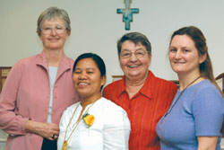 Our Lady's Missionaries leadership team, L-R: Srs. Frances Brady, Joan Missiaen, and Christine Gebel, with Sr. Anie Montejo (front) at the celebration of her first vows, February 2, 2008. Toronto.