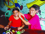 Sr. Lucy Lee and 13-year-old Jessica Sequeira, a top student in Sr. Lucy’s jewellery-making class in Fortaleza, Brazil.