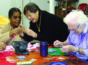 While in Canada, Sr. Lucy taught beading to Sivasothy Velauthatillai (left), Lorraine Steele (right), and other seniors at Harmony Hall in Toronto.