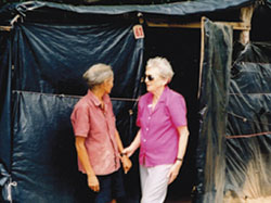 Sr. Clarice Garvey with a member of a community of landless families who had been camped on the roadside while awaiting the government's decision on their request for ownership of land through the Agrarian Reform Program.