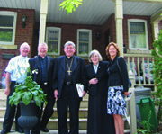 A house of welcome.   Refuge from the streets of Toronto can be hard to come by, but Sr. Susan Moran of Our Lady’s Missionaries is relentless in her pursuit. The co-founder of Toronto’s Out of the Cold program persuaded the University of St. Michael’s College and the Seeds of Hope Foundation to join forces to open Lazarus House, a downtown community of welcome for the poor and homeless. Above: On hand for the blessing are:L-R, Scarboro missionary Fr. Mike Traher, Fr. Paul McGill, Archbishop Thomas Collins, Sr. Susan Moran, and Isabelle Sisi, executive assistant to Dr. Richard Alway, president of St. Michael’s College. (Photo courtesy of St. Michael’s College.)