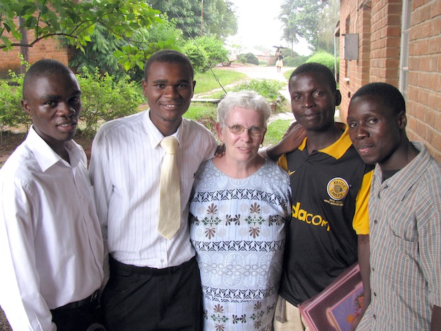 Sr. Ann with Form 4 students (now graduates) (L-R): Thumbiko, Harris, Robert and Philip—her “favoured ones” who, in their final year, tutored and mentored other students.