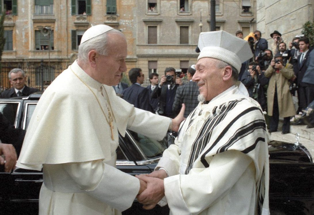 Rome’s Chief Rabbi – Elio Toaff – welcomes John Paul II; the first papal visit to Rome’s Grand Synagogue. 1986